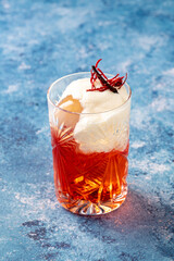 Elegant luxury cocktail in front of dark background