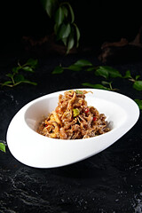 Sichuan and Hunan style cold dish with fresh pepper and sweet and spicy duck intestines