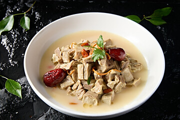 Winter nourishing soup with cordyceps flowers, wolfberries and red dates stewed with lamb belly