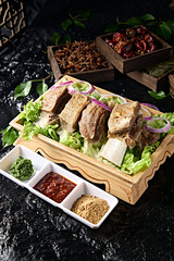 Traditional Mongolian food: Hand-held lamb chops