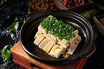 Baked taro strips with green onion in casserole