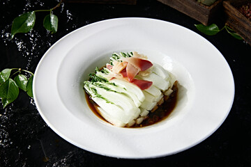 Arctic scallops with sauce and cabbage core