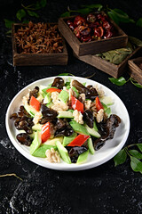 Stir-fried zucchini, black fungus, bell pepper and peach kernels