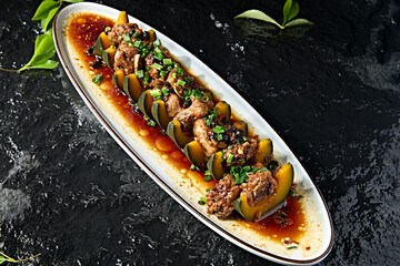 Chinese food: Steamed pork ribs with black bean and pumpkin