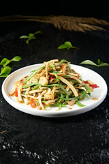 Stir-fried shredded pork with garlic and green beans, rice pepper and dried tofu