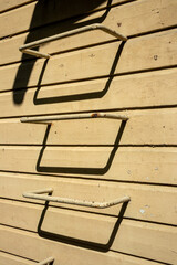 old metal fire escape steps on building wall