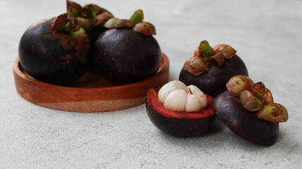 Mangosteen isolated on grey background. Clipping path.	