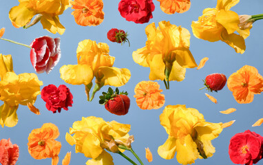 Bright floral and fruit pattern featuring yellow flowers, red carnations, and strawberries on a soft blue background. Fresh and playful summer design