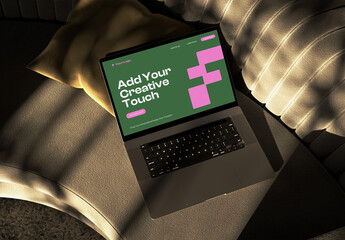 Laptop on Sofa Seat Mockup