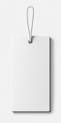 Fototapeta premium Blank white rectangular tag with string hanger