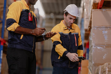 Warehouse manager, store inspector checking stock on storage shelf from inventory checklist. Two...