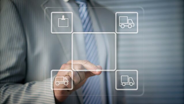 A businessman interacts with a virtual interface featuring logistics and transportation icons.