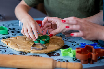 Mother and son bond over making gingerbread in their stylish kitchen