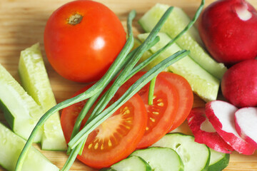 The vegetables on the cutting Board.