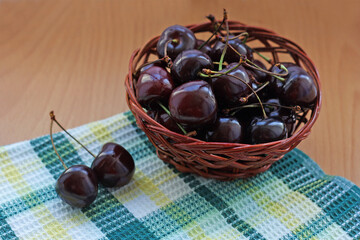 Cherries in a basket.