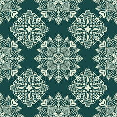 Lace seamless pattern on green background. Traditional, ethnic, motifs. Mandala oriental ornament. Vector design for printing on fabric or paper. Hand drawn background.