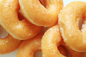 Closeup of Pile of Sugar-glazed Doughnuts for Background or Wallpaper