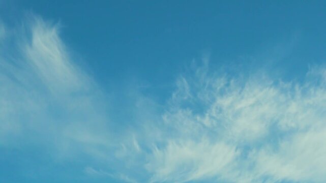 Sunny Blue Sky and White Clouds Time Lapse, Slow Motion. White Clouds and Pure Azure Blue Skyscraper, Atmosphere, Aerial Drone View, Air Plane Window View, Firmamemt, Heaven Background.