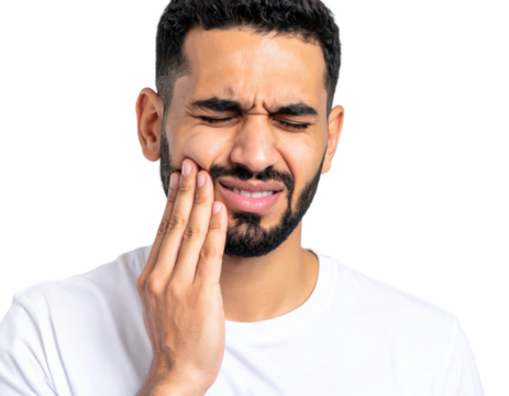 A man in a white shirt grimaces in pain while holding his cheek, suggesting toothache or jaw discomfort.