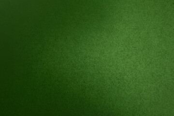 Solid green tone color paint on blank eco environmental friendly cardboard box paper texture background with space minimal simple style 