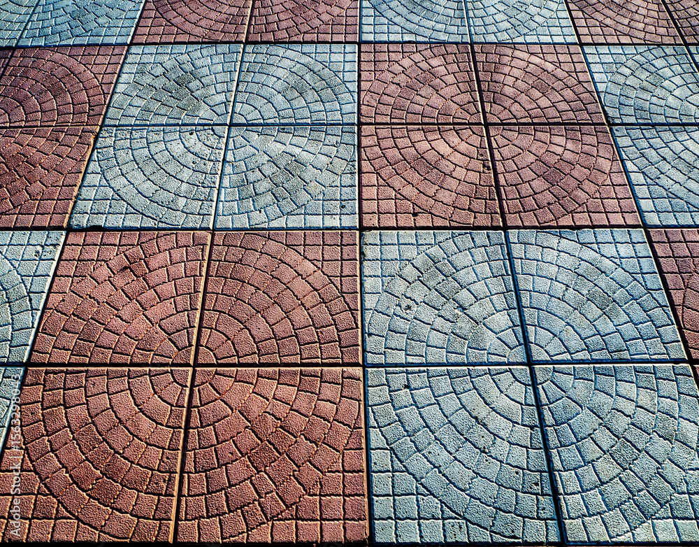 Poster abstract background from paving slabs in perspective. the pattern of gray and red circles was create