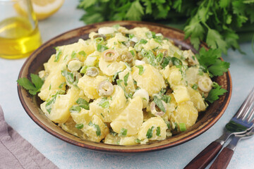 A bowl with Greek potato salads
