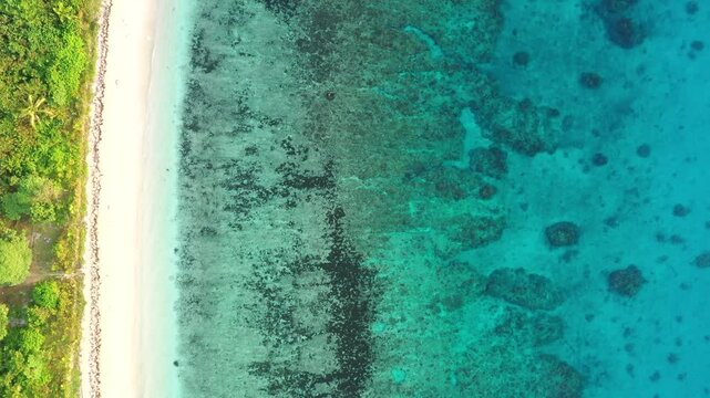 Coral reefs aerial beach to sky panorama Tokoriki island in Fiji pacific holiday destination.
