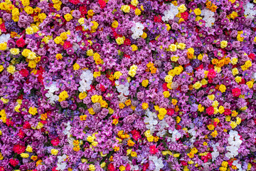 Close-up view of a densely packed arrangement of artificial flowers