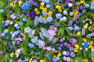 Close-up view of a densely packed arrangement of artificial flowers