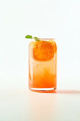 Orange soda, a carbonated drink filled with ice to cool you down