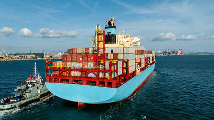 logistic cargo container ship sailing in sea to import export goods and distributing products to...