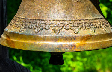 Ringing the Christian bell on the wooden house in Austria.