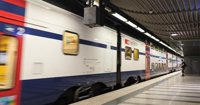 01-07-2025 Zurich, Switzerland. S5 passenger train leaving from underground station at Hauptbahnhof main station, final destination Zug. Wide angle view, real time