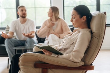 Arguing, feeling bad. Couple are at psychologist appointment