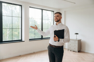 Real estate agent is in the new room