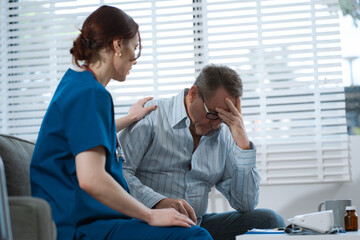 Fototapeta premium doctor talking with man patient for monitoring and check up. doctor touching patient hand and consoling.