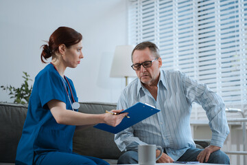 Obraz premium Elderly health checkups with a physician or psychiatrist who works with patients who are consulted about male or psychiatric diagnosis in a medical clinic mental health service.