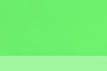 Empty green room studio. Minimal background for product presentation. Summer Autumn backdrop. Cosmetic and beauty products display room.