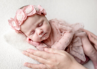 Baby Girl Sleeping During A Studio Photoshoot