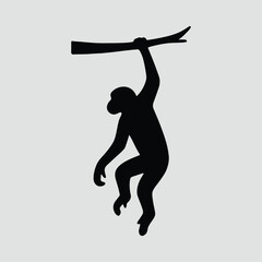 Silhouette of a monkey hanging on a branch vector illustration