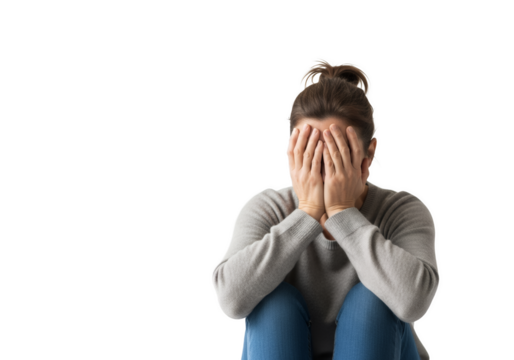 Distraught woman hides face, conveying sorrow, stress, or mental health issues