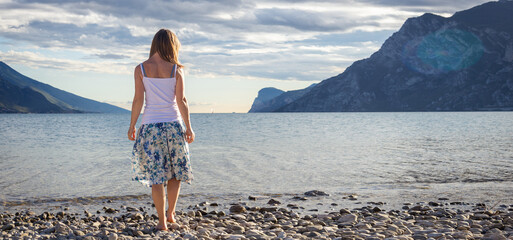 Woman standing at the lake