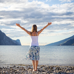 Woman standing at the lake