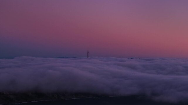 Aerial view of Sutro Tower amidst clouds, United States.