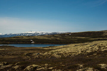 Blue Lake and Snowy Peaks of Norway