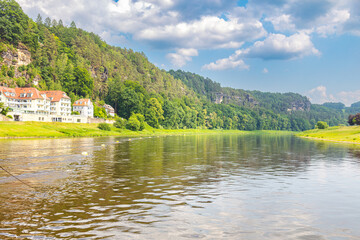 Rathen, Saxon Switzerland National Park, Germany June 3, 2025: Colorful traditional guesthouses and...
