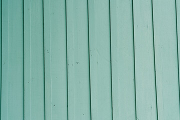 Green background. Textured Wooden Plank Wall in Soft Mint Green Color with Vertical Stripes and...