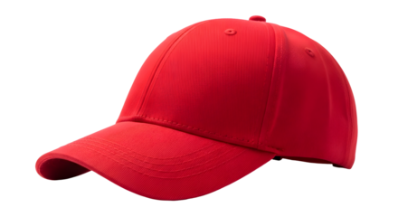 Isolated red baseball cap on a black background displaying its simple design and vibrant color tone