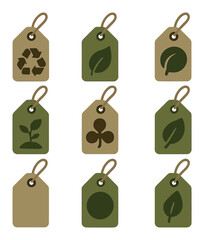 Eco-Friendly Tag Icons. Solid, filled icons set of eco-friendly pricing tags: recycled paper tag, green leaf