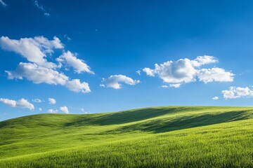 Peaceful green rolling hills under bright blue sky with fluffy white clouds, symbolizing freshness, freedom, and natural beauty